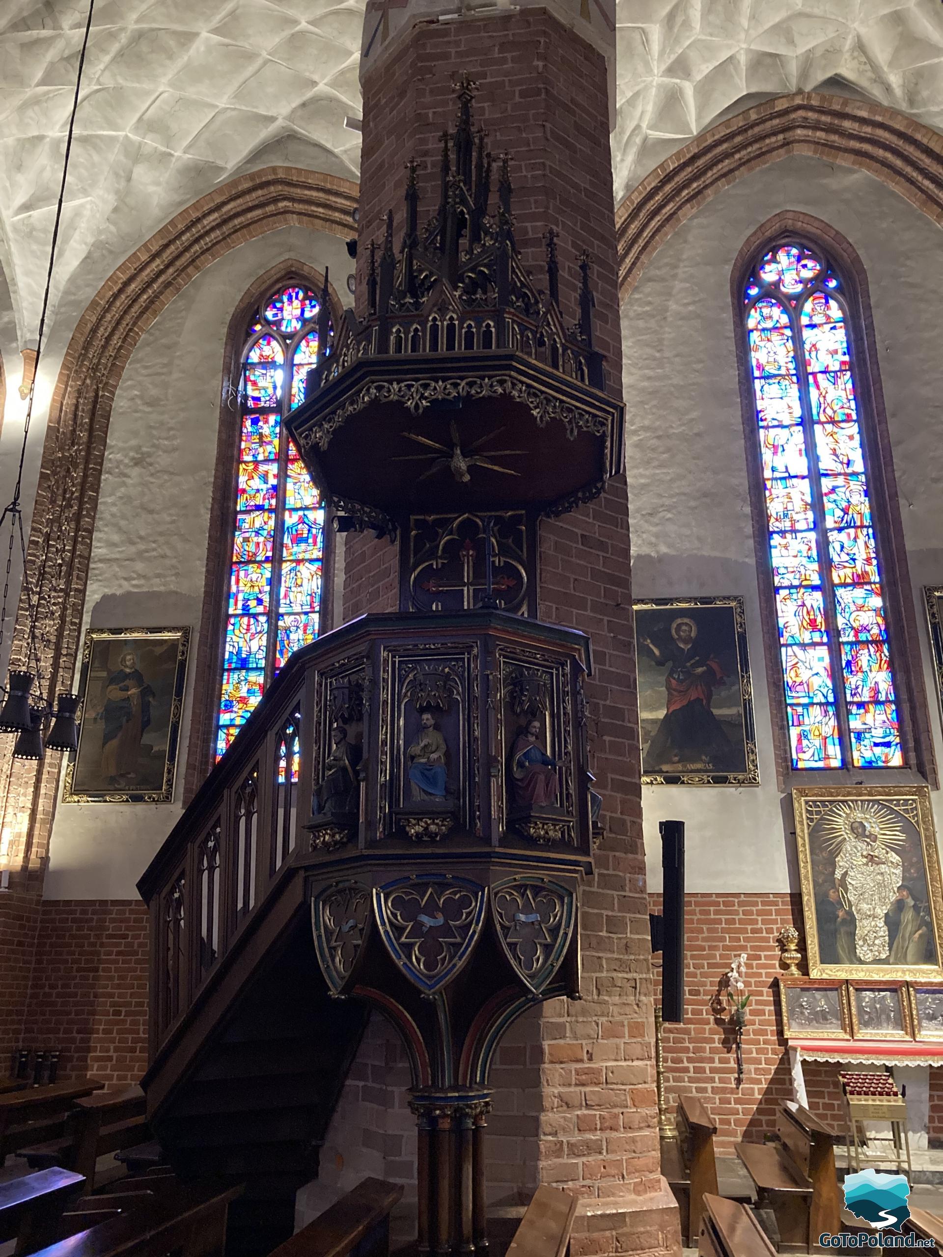 a wooden pulpit in the cathedral