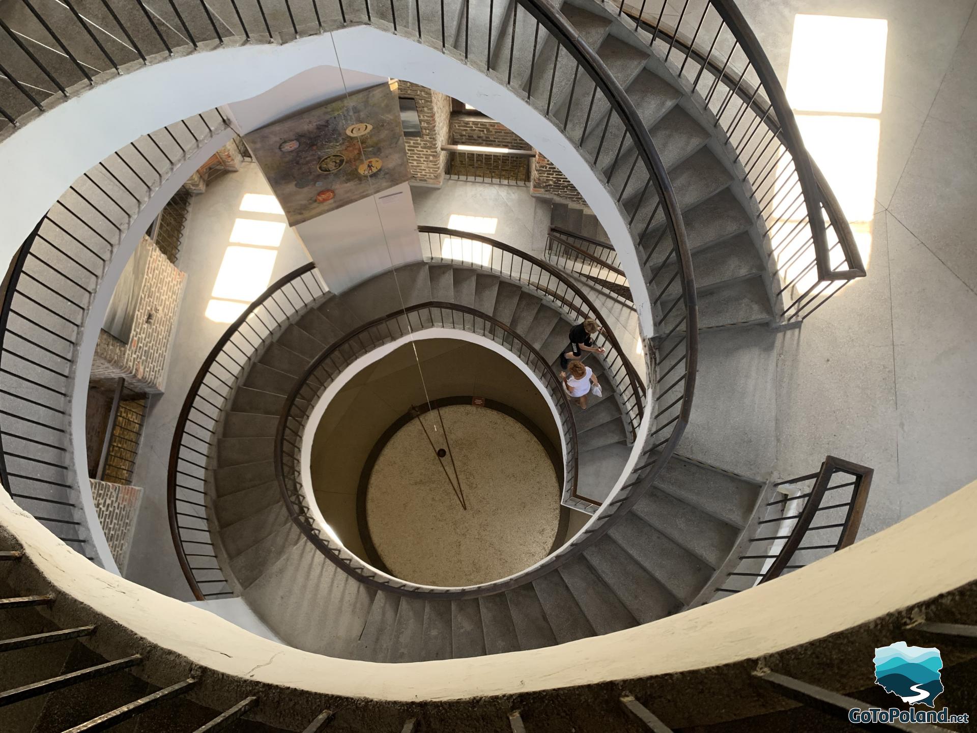 top view of the stairs in the tower and the Foucault pendulum at the bottom