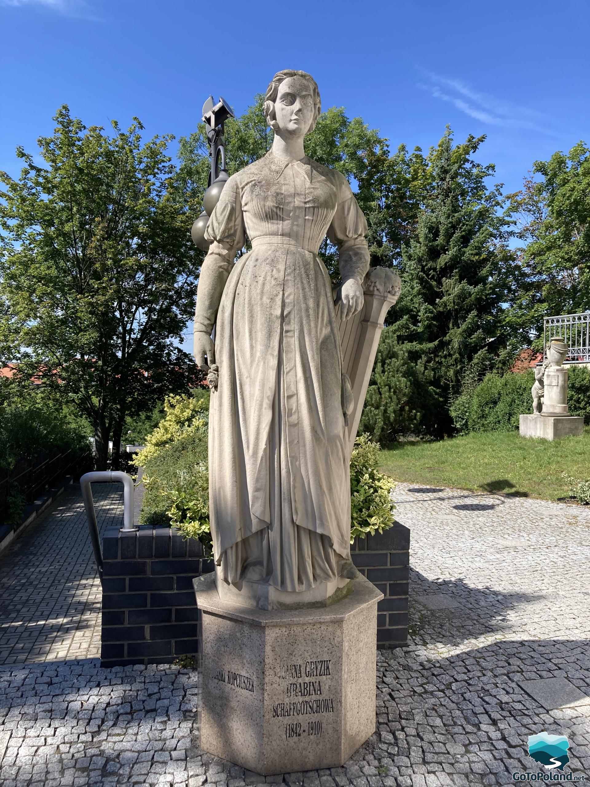 a stone sculpture of Opoles Cinderella