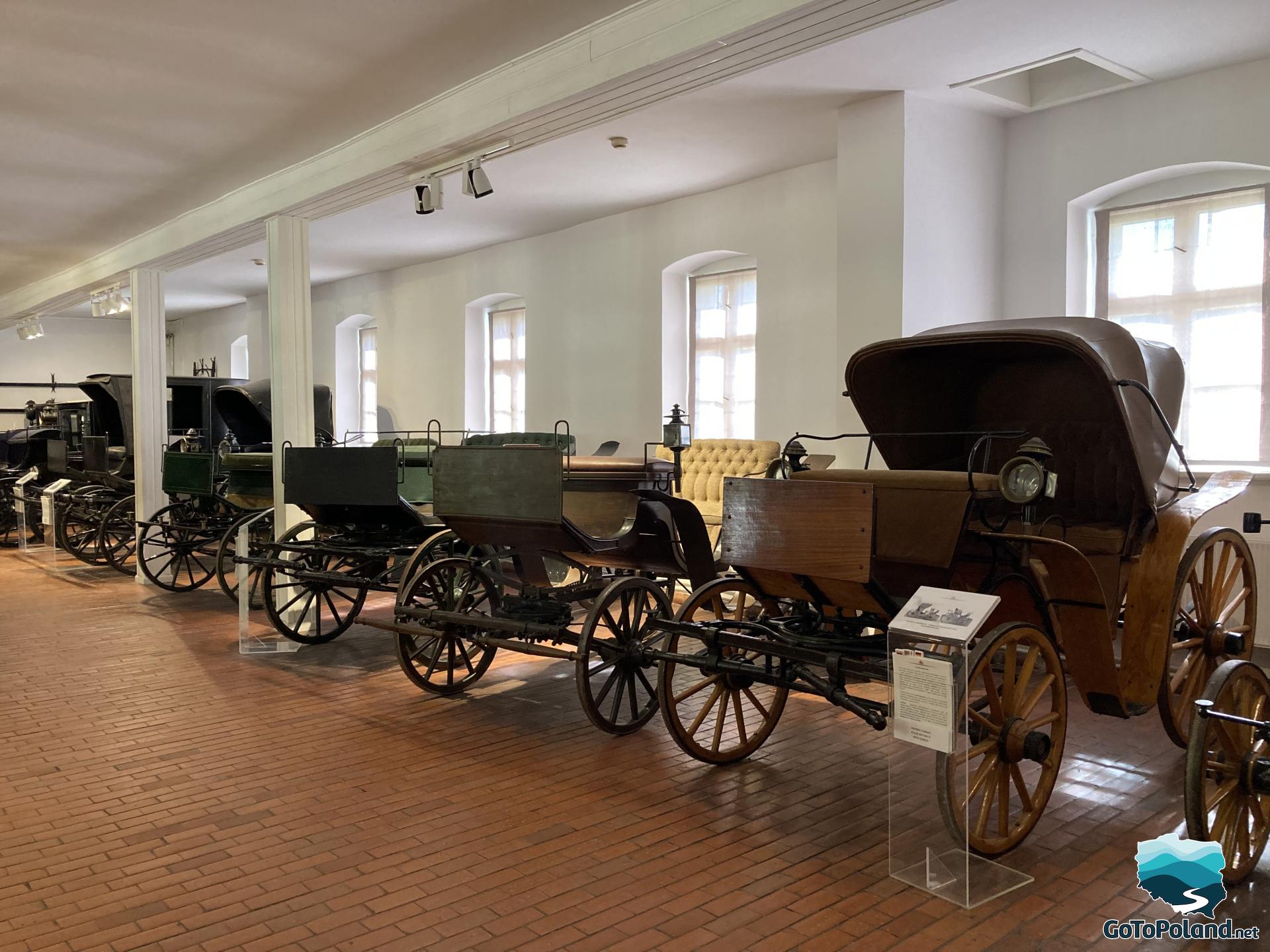 a row of vintage carriages