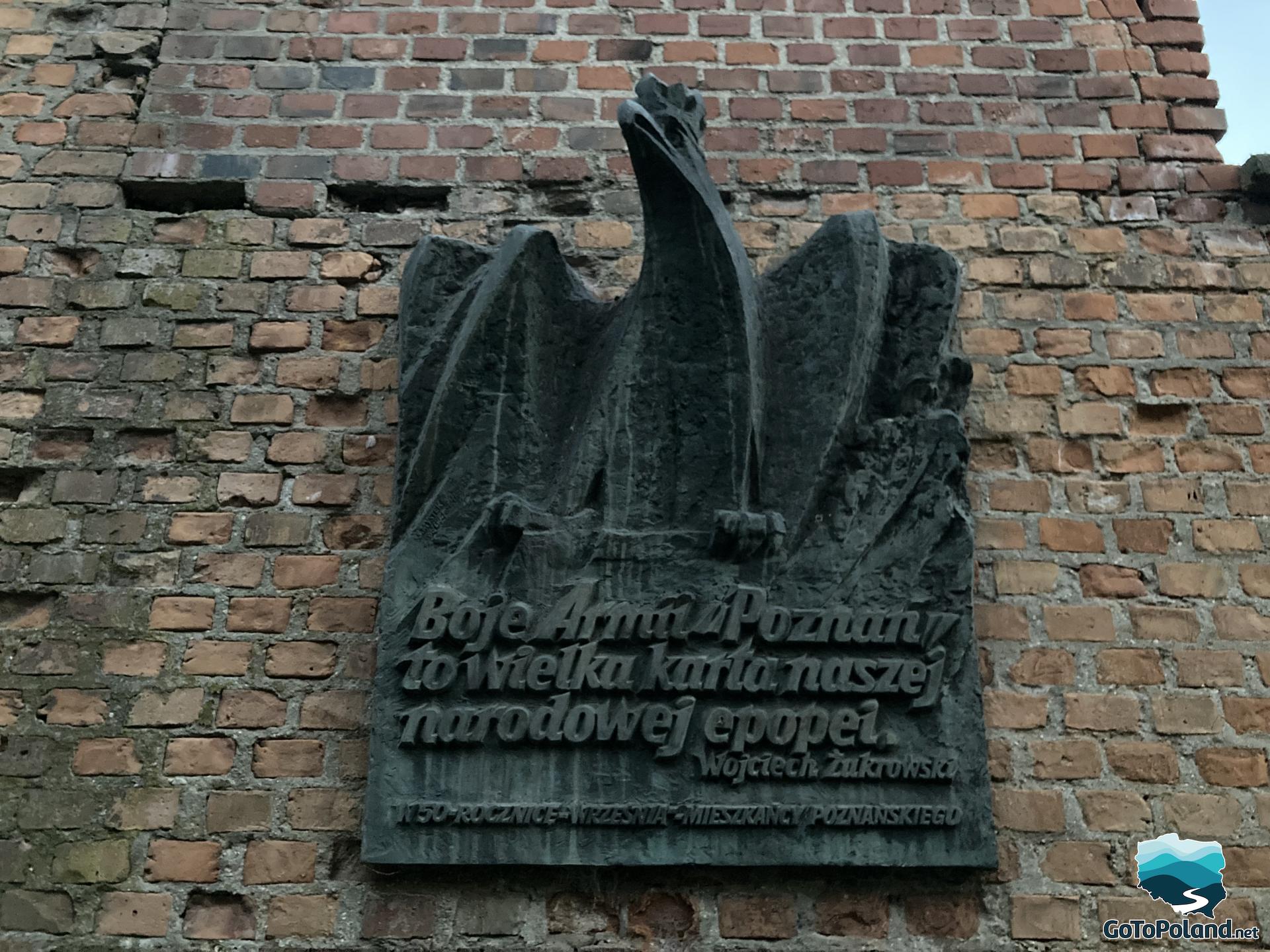 a statue of an eagle commemorating the soldiers of the Poznań Army