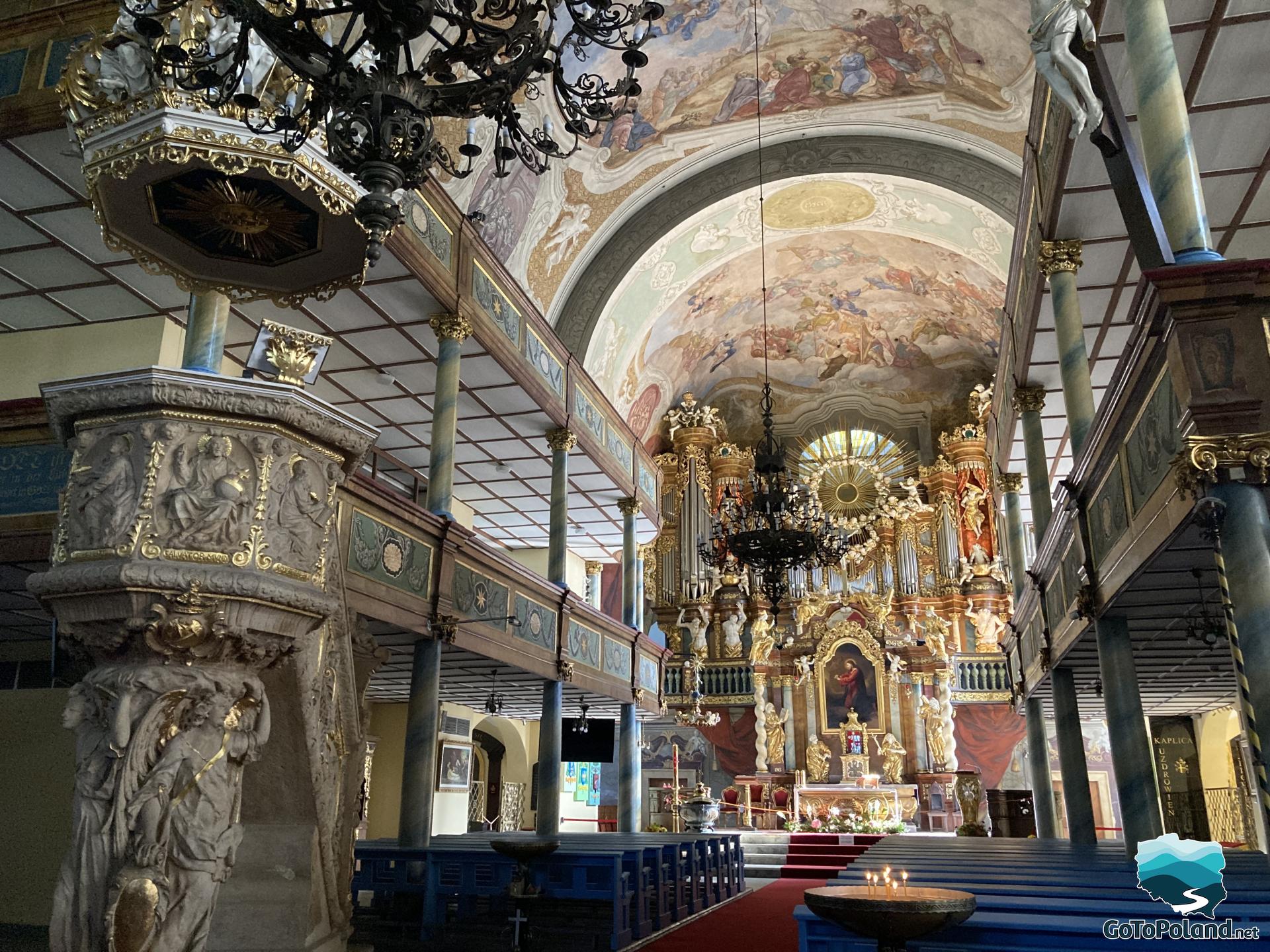 An interior of the church with decorated pulpit