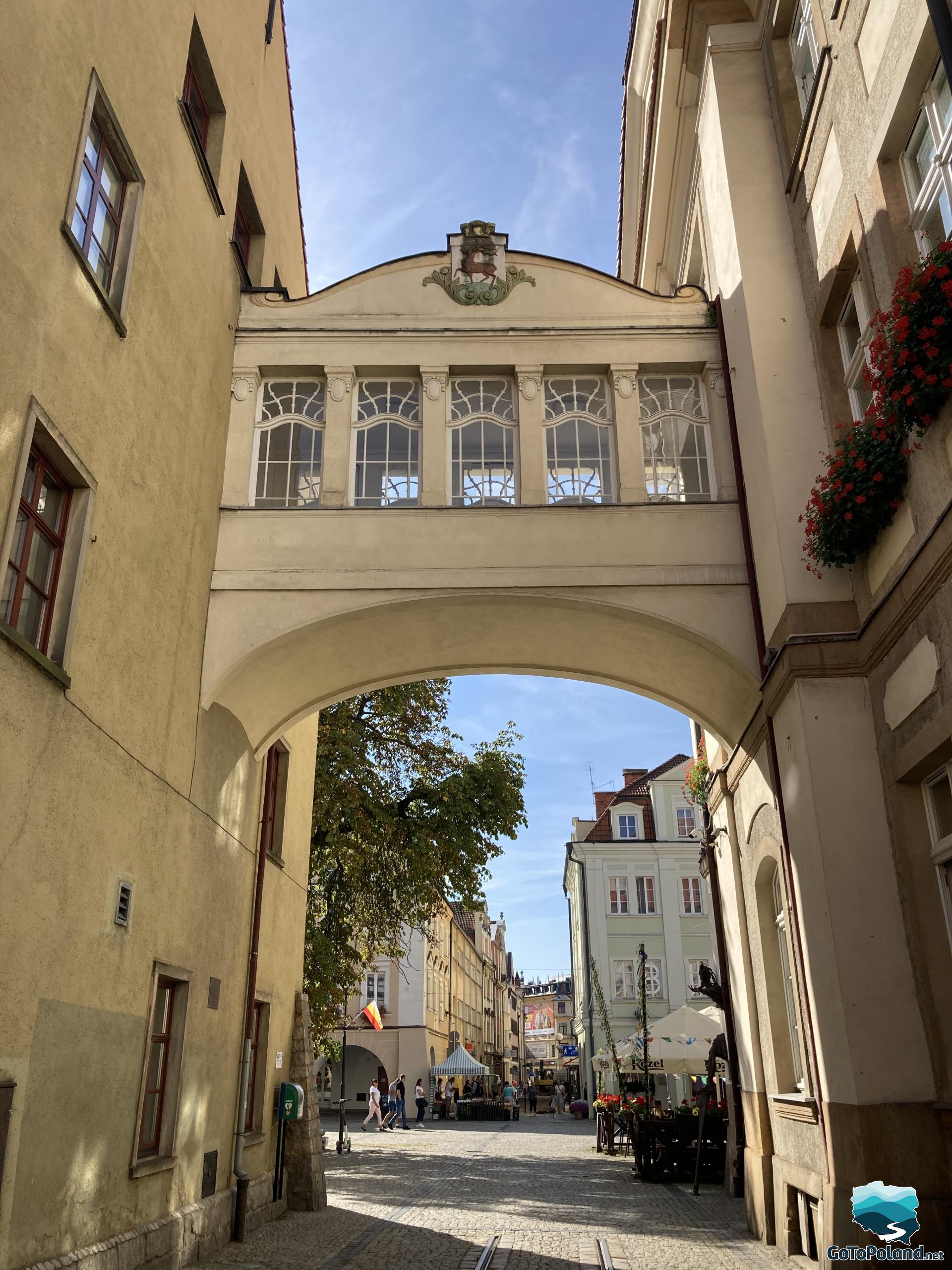 The town hall connector between two bright buildings