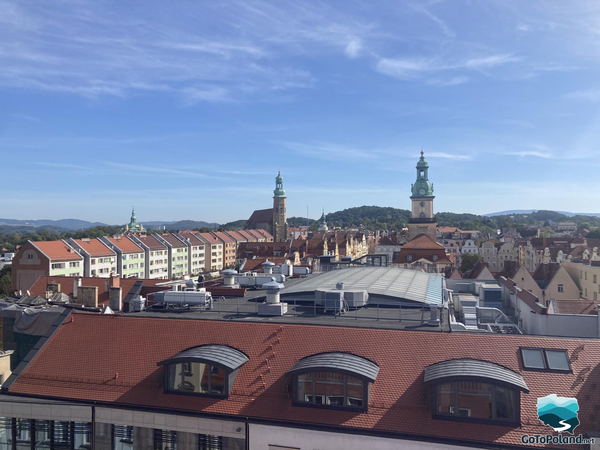 view of the colorful tenement houses, the town hall and three churches