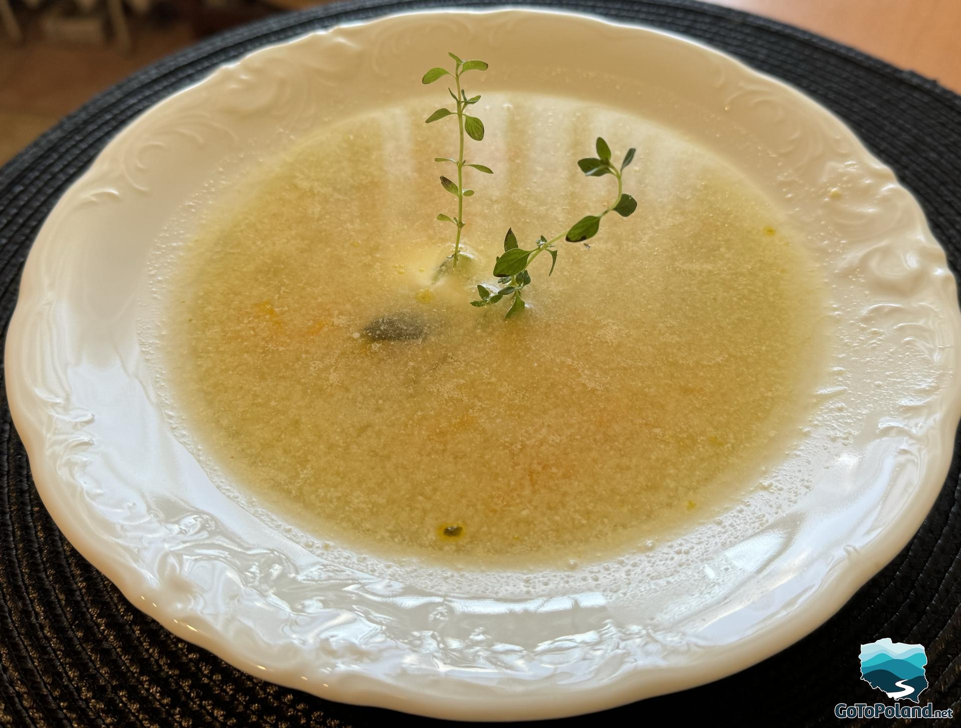 a soup in a white plate