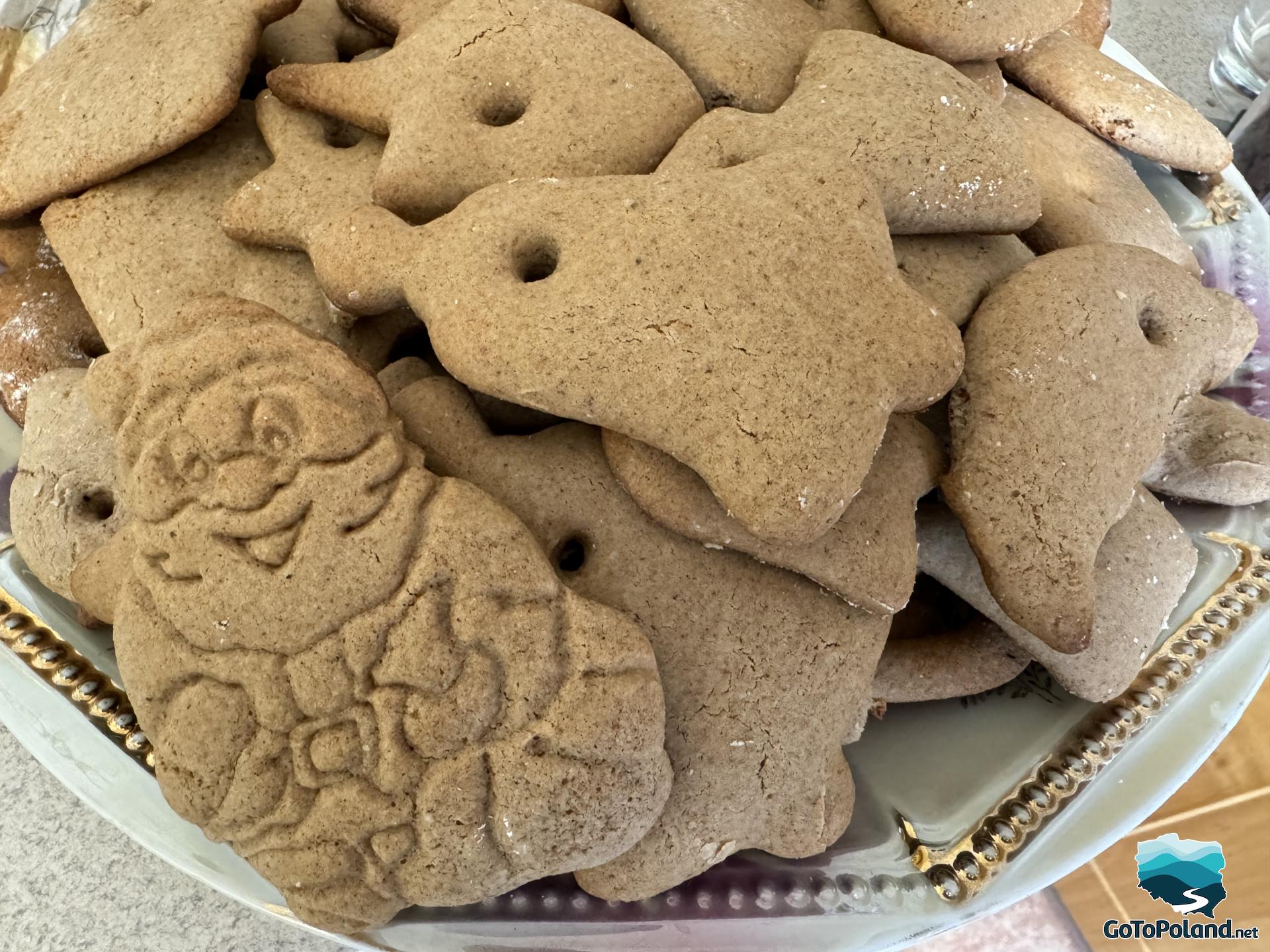 gingerbread cookies in the shape of Christmas symbols