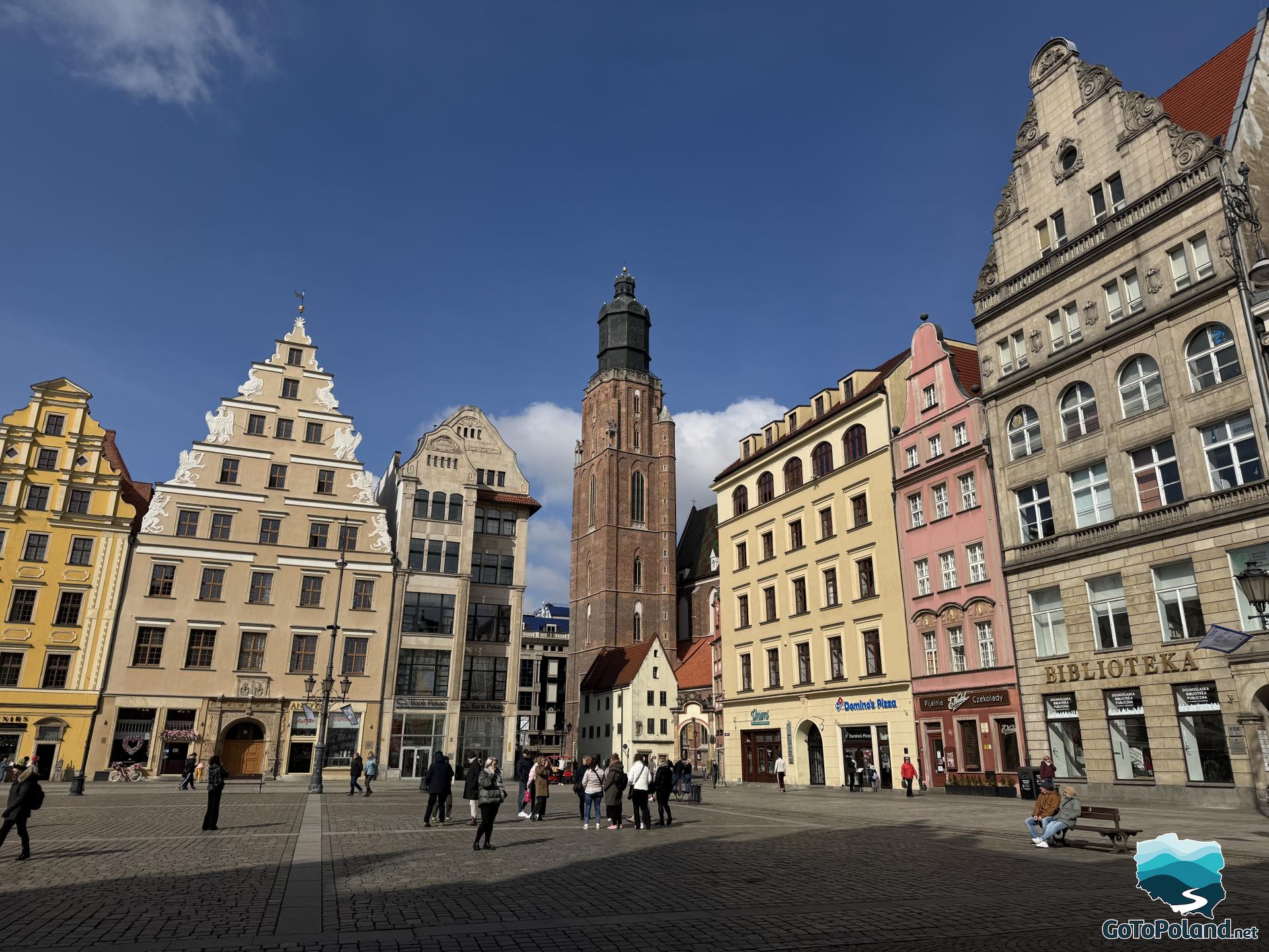 colorful tenement houses on a market square