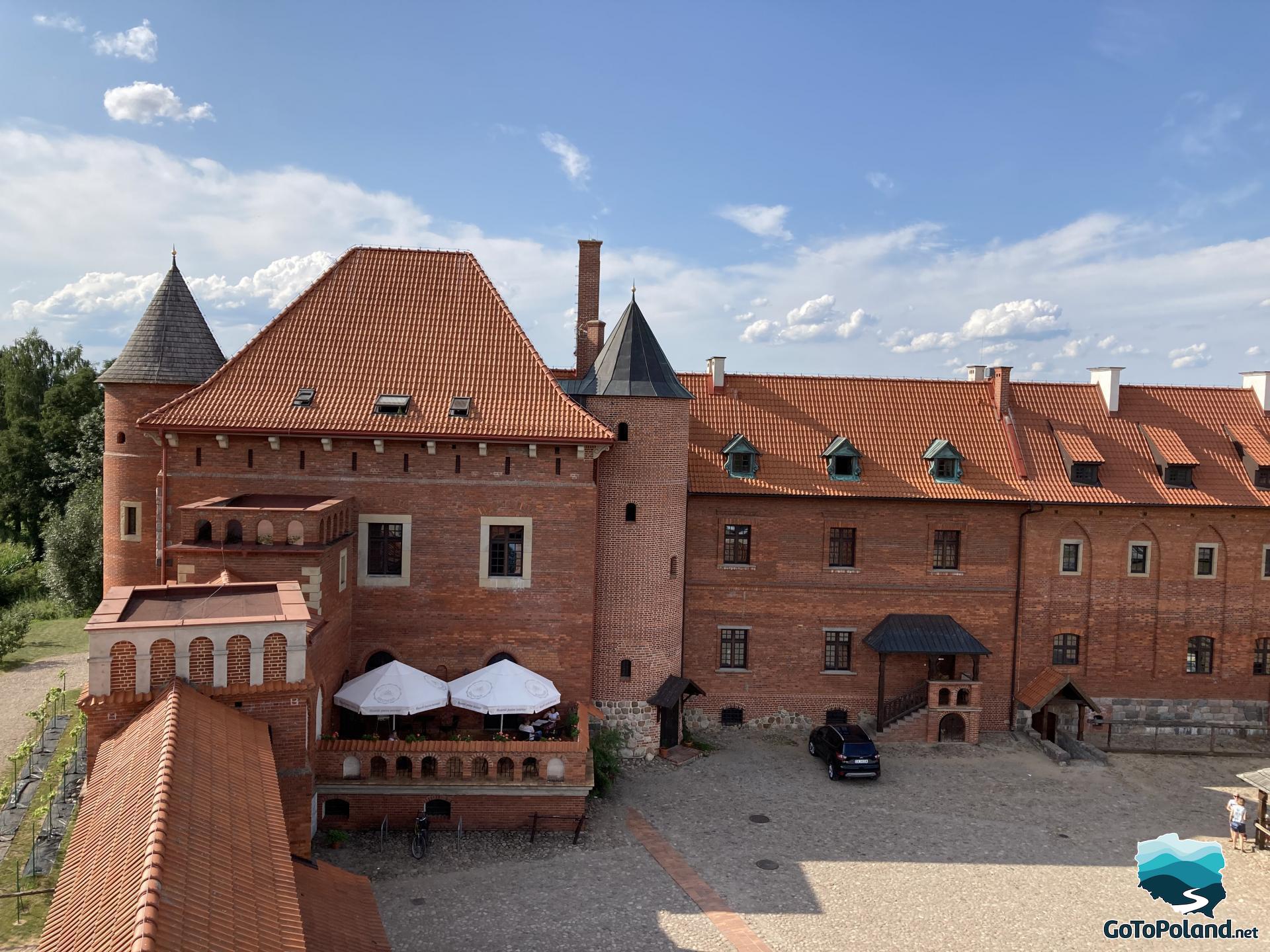 another view of a castle made of red bricks
