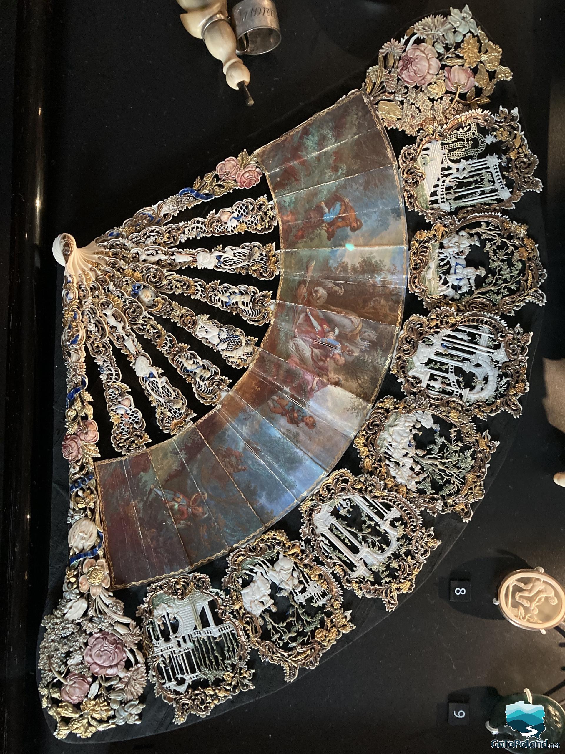 antique hand fan close up