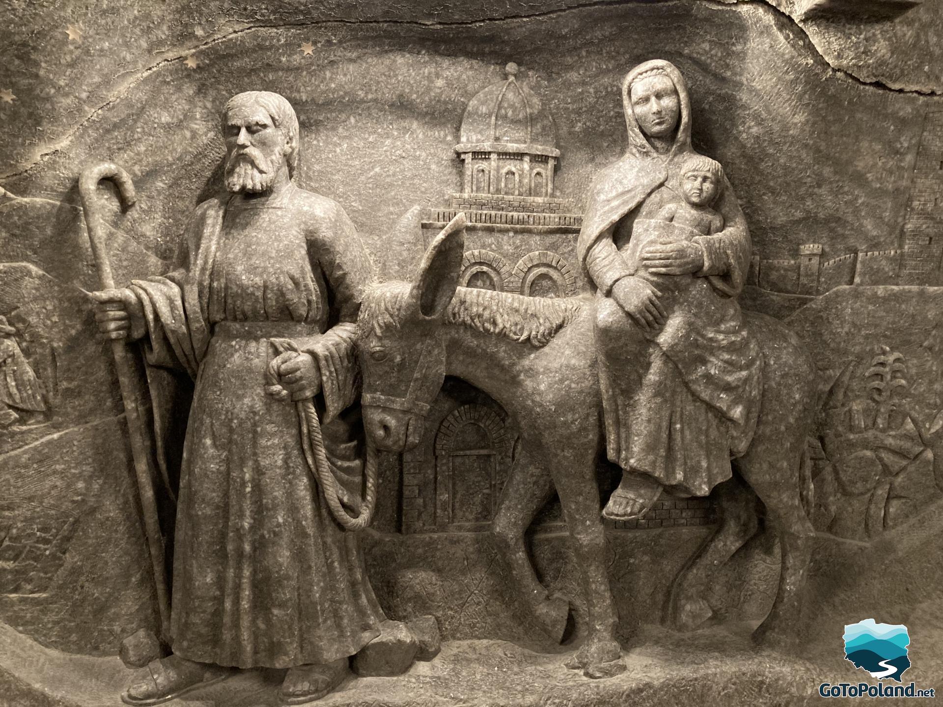 a saint family carved in salt wall