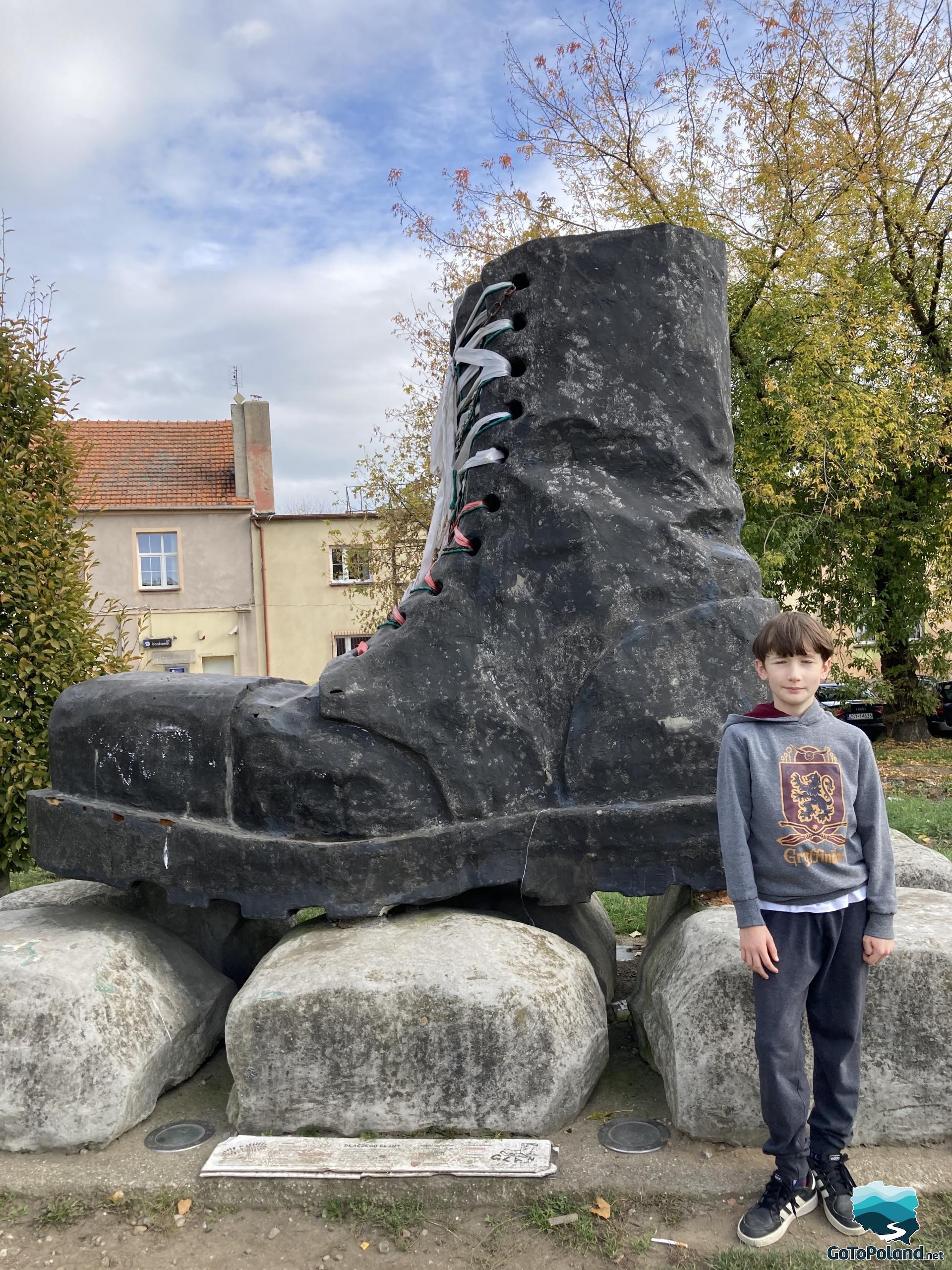 A large monument of a rock boot