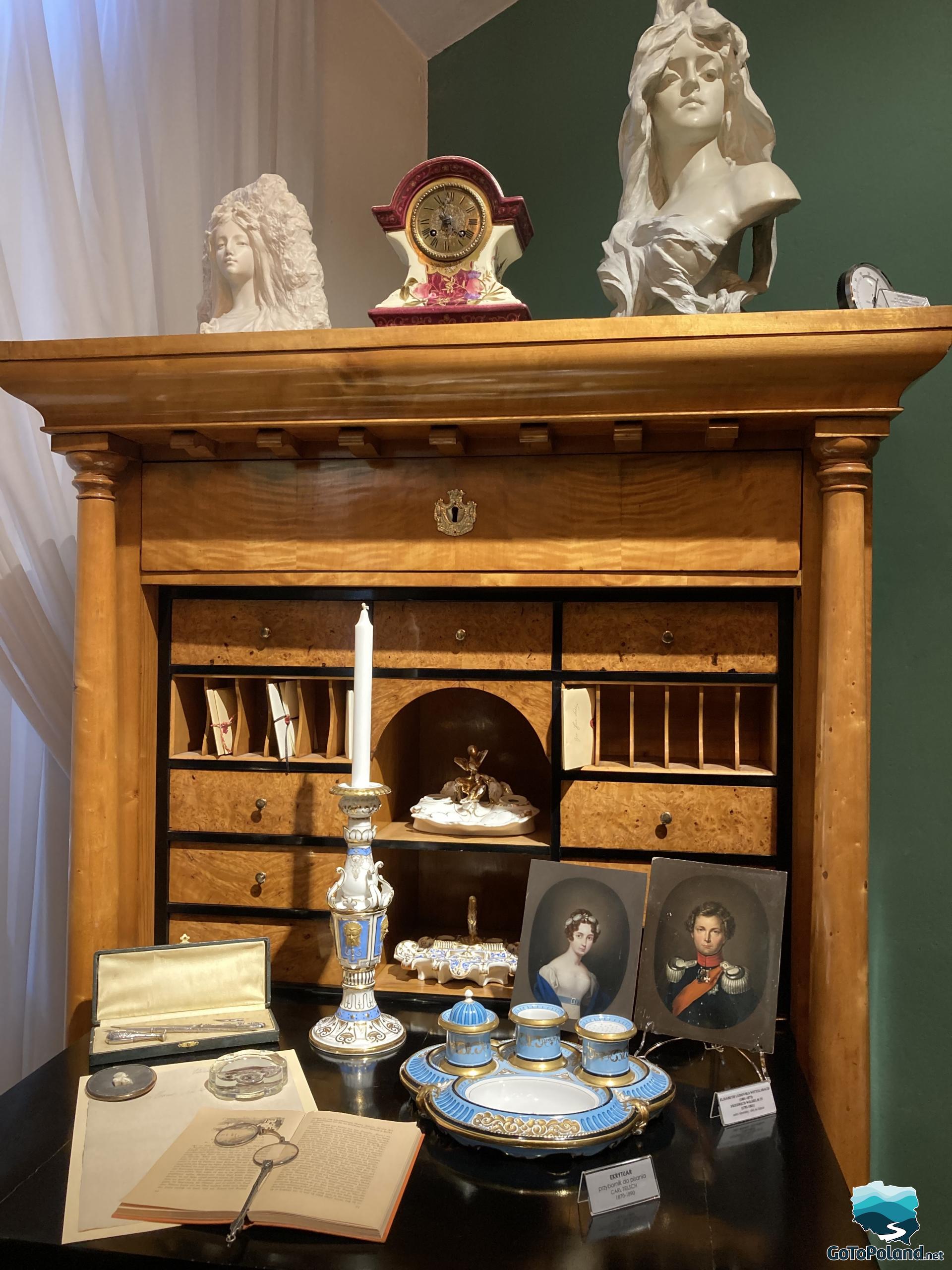 a display case with the porcelain objects