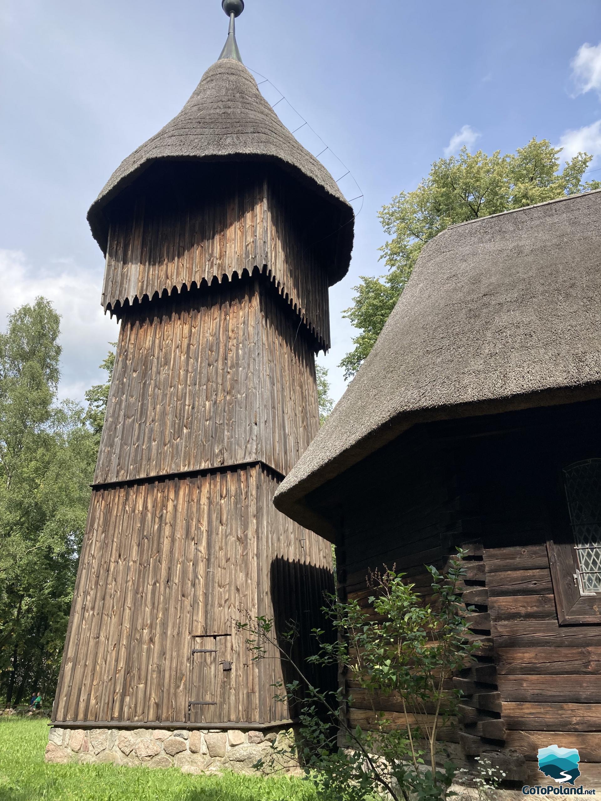 a wooden tower belonging to the wooden building