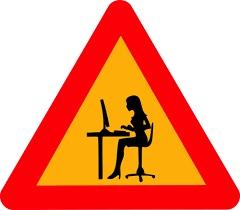 graphic sign of a woman working at the computer