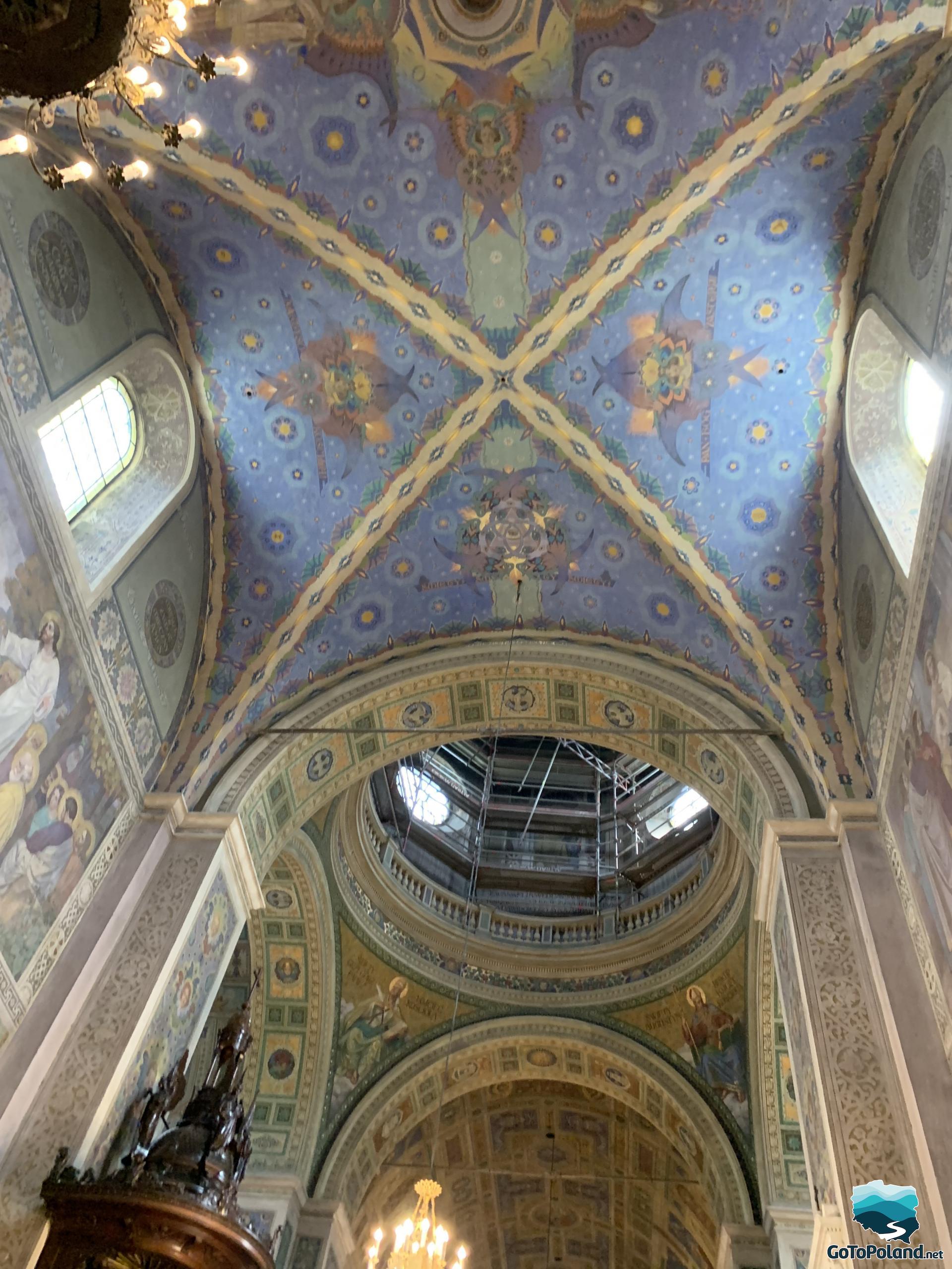 A blue ceiling in a church