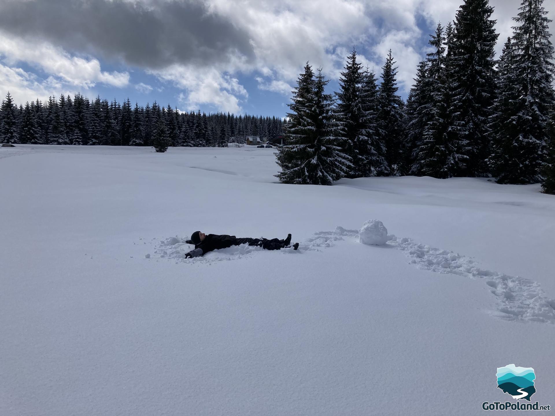 A man lying in the snow